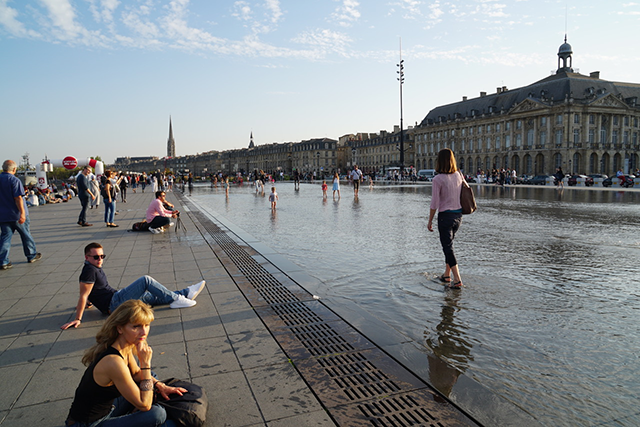 Photo of Community enjoying the plaza in the city of Bordeaux, France.